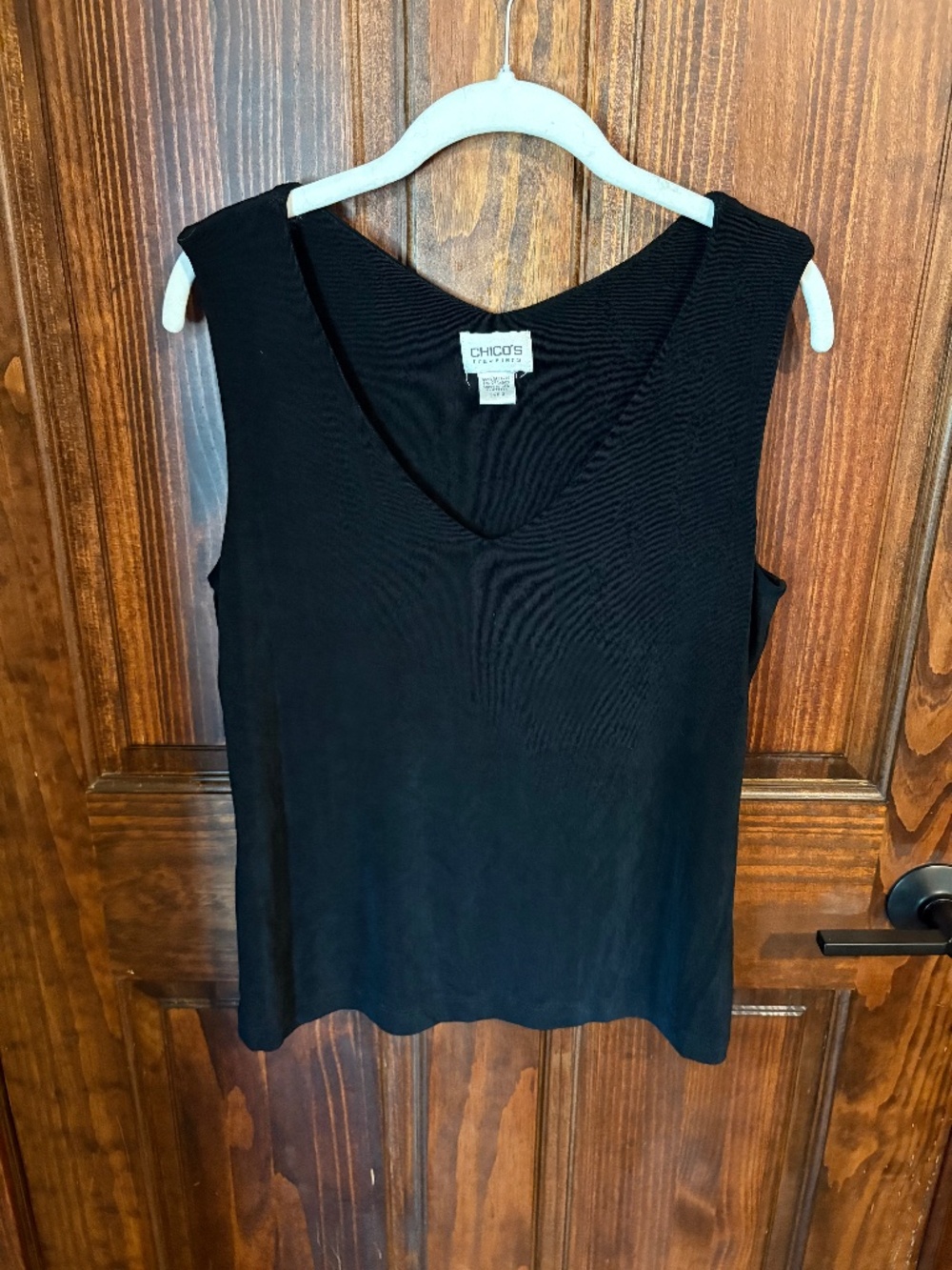 Chico's Travelers size 2 black v-neck tank with soft ribbed feel, used